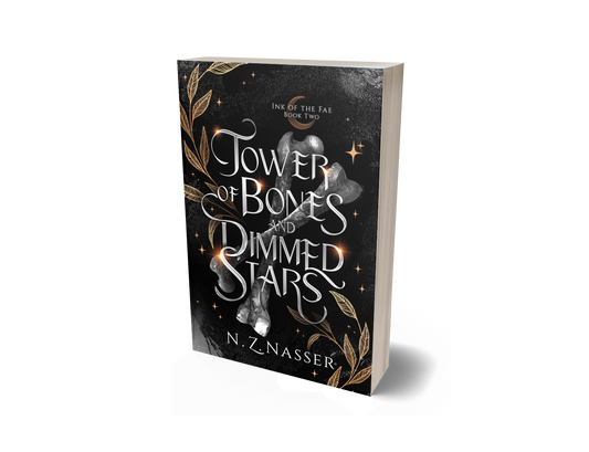 Book cover with a black background, silver bones, gold leaf work and the title Tower of Bones and Dimmed Stars